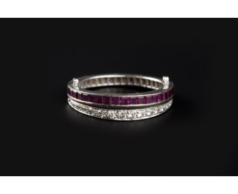 A COLLECTION OF JEWELLERY, comprising a swivel full hoop ring, channel set to one side with calibré-cut sapphires and to the 