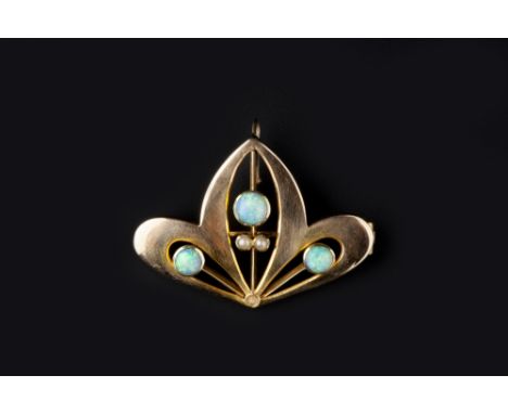 AN OPAL AND SEED PEARL BROOCH/PENDANT, the stylised openwork leaf-shaped panel highlighted with seed pearls and a trio of cab