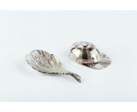 A SILVER NOVELTY CADDY SPOON in the form of a feathered bird, its head forming the handle, by C.J. Vander, London 1977, 7.5cm