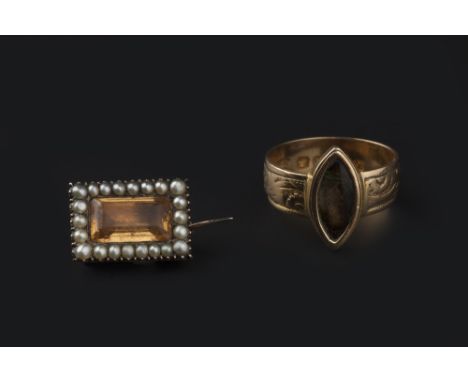 A 19TH CENTURY MEMORIAL RING AND A PANEL BROOCH, the ring with central navette-shaped panel, to a uniform band engraved with 