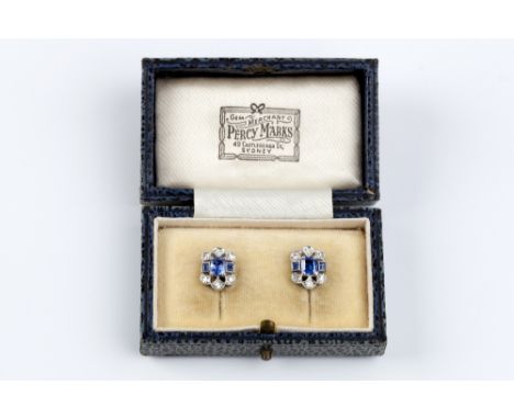 A PAIR OF SAPPHIRE AND DIAMOND EARSTUDS, each openwork millegrained panel centred with a trio of octagonal and rectangular st