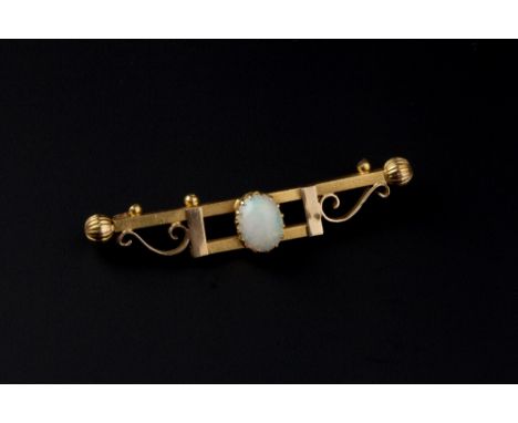 AN OPAL BAR BROOCH, the oval cabochon opal claw set to a shaped openwork bar with scrolled decoration, stamped '15ct', togeth