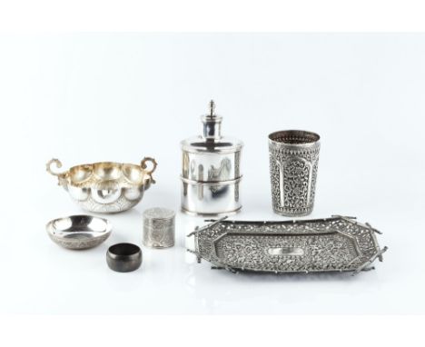 A SMALL COLLECTION OF EASTERN WHITE METAL ITEMS, a beaker, twin handled lobed dish, coin inset dish, an oval plated caddy, an