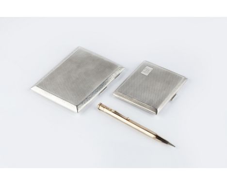 A SILVER CIGARETTE CASE, with engine turned decoration by Trevitt & Sons, Chester 1911, 11.5cm; a similar smaller silver ciga