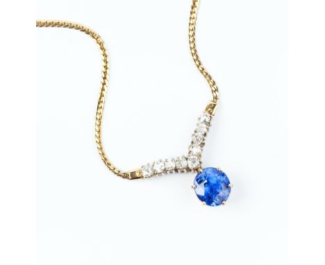 A SAPPHIRE AND DIAMOND PENDANT NECKLACE, the oval mixed-cut sapphire in later six claw setting, surmounted by a wishbone-shap