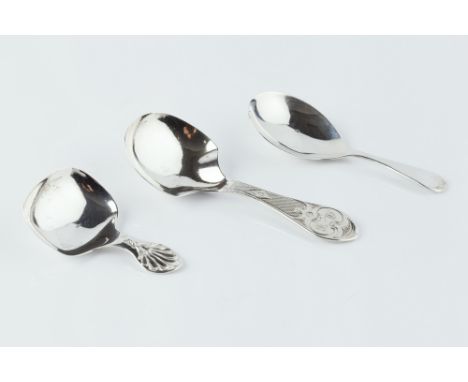 A 19TH CENTURY SILVER CADDY SPOON, with engraved handle by George Unite, Birmingham 1859, 9cm long; and two further caddy spo