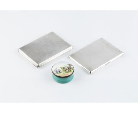 A SILVER RECTANGULAR CIGARETTE CASE, with slide opening and engine turned decoration, by Garrard & Co Ltd, London 1954, 11.5c