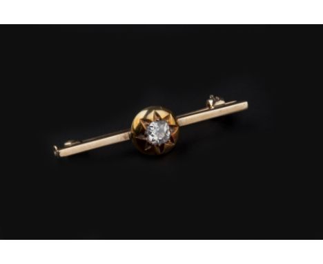 A DIAMOND SINGLE STONE BAR BROOCH, the cushion-shaped old-cut diamond in star-shaped setting, applied to later bar mount, yel