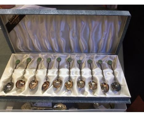 A SET OF TWELVE CHINESE WHITE METAL COFFEE SPOONS, with cabochon jade inset terminals, cased; a Chinese salt, a set of five C