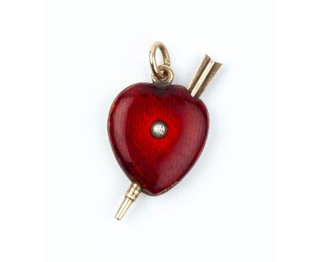 AN ENAMEL AND DIAMOND SET HEART PENDANT/PROPELLING PENCIL, the heart-shaped panel heightened with red guilloché enamel and ce