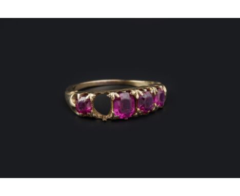A RUBY HALF HOOP RING, the graduated cushion-shaped mixed-cut rubies in claw setting, between fluted shoulders, yellow precio