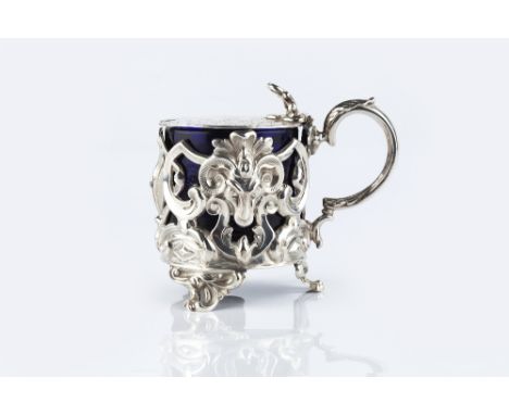 AN EARLY VICTORIAN SILVER TANKARD MUSTARD, the sides pierced and repoussé decorated with rams' masks, acanthus and 'C' scroll