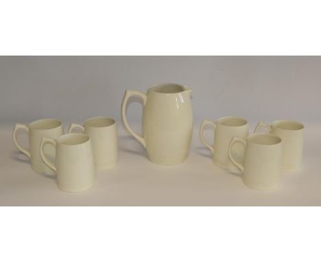Keith Day Pearce Murray (New Zealand, 1892-1981) for Wedgwood: An Art Deco Lemonade Set, in matt straw, comprising a large pi