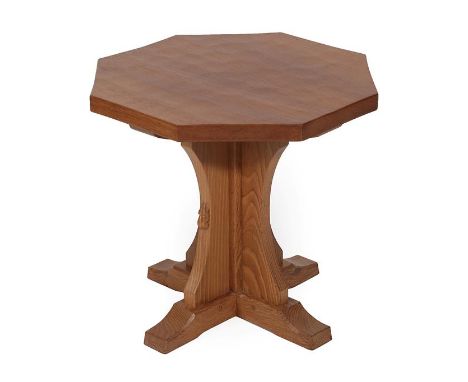 Workshop of Robert Mouseman Thompson (Kilburn): An English Oak Octagonal Coffee Table, post 1960, adzed top, on a cruciform b