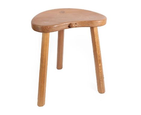 Workshop of Robert Mouseman Thompson (Kilburn): An English Oak Cow Stool, post 1970, the kidney shaped seat on three octagona