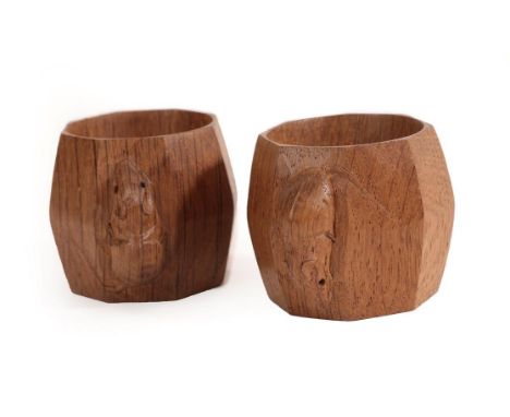 Workshop of Robert Mouseman Thompson (Kilburn): A Pair of English Oak Napkin Rings, of octagonal shape, each with carved mous