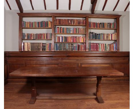 Workshop of Robert Mouseman Thompson (Kilburn): An 8ft English Oak Refectory Table, on two octagonal legs joined by a stretch