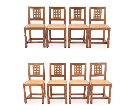 Workshop of Robert Mouseman Thompson (Kilburn): A Set of Eight English Oak Lattice-Back Dining Chairs, dated 28/10/09, nailed