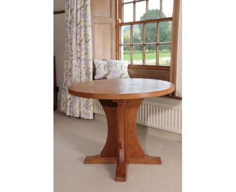 Workshop of Robert Mouseman Thompson (Kilburn): A 3ft English Oak Circular Dining Table, on a cruciform base, with carved mou