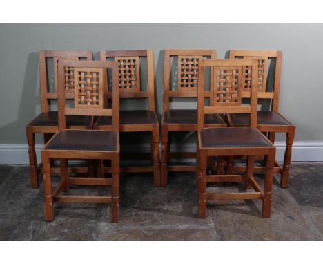 Workshop of Robert Mouseman Thompson (Kilburn): Six English Oak High Lattice Back Dining Chairs, chocolate cow hide seats, on