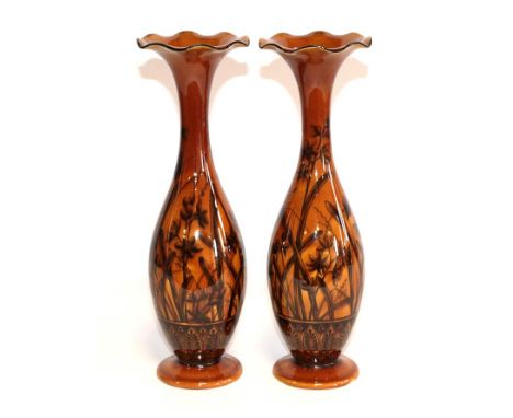 A Pair of Linthorpe Pottery Vases, shape 1464, decorated by Fred Brown with bullrushes and flowers in mustard glaze, impresse