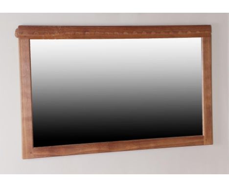 Workshop of Robert Mouseman Thompson (Kilburn): An English Oak Landscape Wall Mirror, with penny moulded top, bevelled edged 