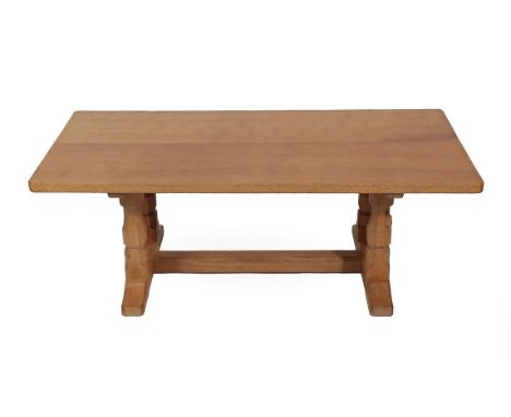 Workshop of Robert Mouseman Thompson (Kilburn): An English Oak 4ft Rectangular Coffee Table, post 1960, on four octagonal leg