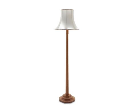A Carthouse Furniture of Thirsk English Oak Standard Lamp, octagonal column and base, with recessed carved cartwheel trademar