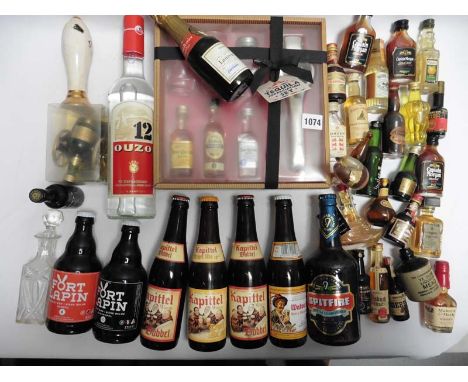 A box of assorted bottles and miniatures including a Tequila set, various bottled beers, Ouzo etc 