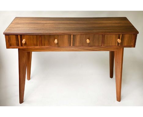 WRITING TABLE, 117cm W x 47cm D x 74cm H, Linley style by Morris &amp; Co., Indian laurel, with three frieze drawers. 