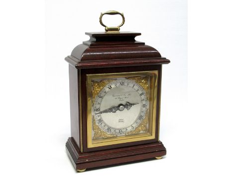 EDWARDIAN CARVED OAK WHEEL BAROMETER/THERMOMETER, (H. 89 CM) AND A COMITTI SHIPS' BRASS TIMEPIECE AND BAROMETER ON MAHOGANY P
