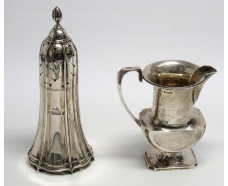 AN EDWARDIAN SILVER SUGAR SIFTER, BY SIBRAY HALL &amp; CO. LTD, LONDON, 1905, OF ELONGATED BELL SHAPED FORM, A FLUTED FINIAL,