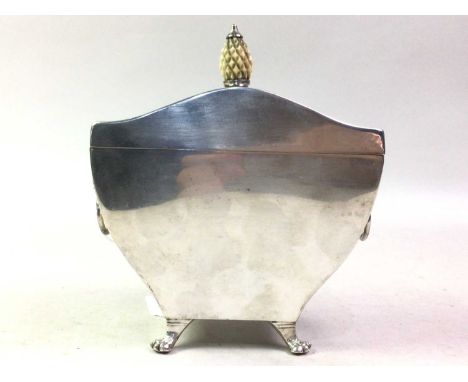SILVER PLATED TEA CADDY, with stylised acorn finial, the body with twin lion mask handles, raised on paw feet14cm high