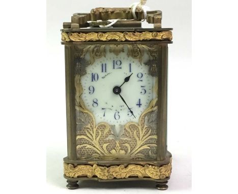 VICTORIAN CARRIAGE CLOCK, the enamel dial with Roman numerals, indistinctly inscribed, contained in a bevelled glass and cast