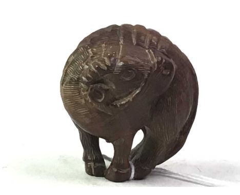 JAPANESE WOODEN NETSUKE, EARLY 20TH CENTURY modelled as a ram, signed to base4.5cm high