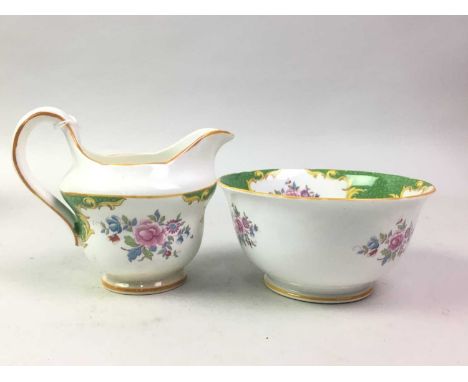 GROSVENOR CHINA TEA SERVICE, YE OLD ENGLISH PATTERN comprising twelve cups, twelve saucers, twelve side plates, two cake plat