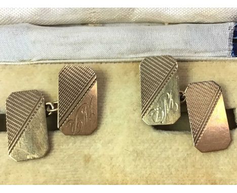 PAIR OF NINE CARAT GOLD CUFFLINKS, engraved with engine turned decoration, in nine carat gold and a small pendant in Charles 