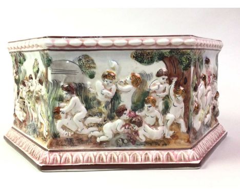 CAPODIMONTE PLANTER, of hexagonal form with cherub decoration14cm high