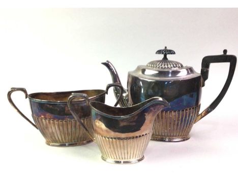 COLLECTION OF PLATED ITEMS, including a three piece part fluted tea service, chamber candlestick, soup ladle, toast rack and 