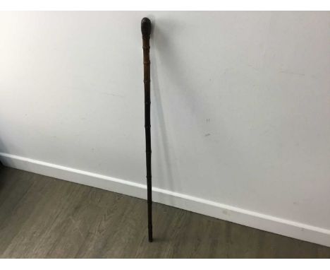 SWORD STICK, LATE 19TH/EARLY 20TH CENTURY with stylised bamboo body, signed F. Escoffier89cm long