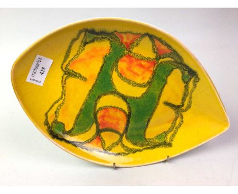 POOLE POTTERY DELPHIS DISH, SHAPE 91 of leaf shape form, decorated with geometric designs, marked to base30.5cm wide