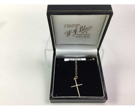 NINE CARAT GOLD CROSS PENDANT, set with a diamond, on a nine carat gold chainQty: 1g