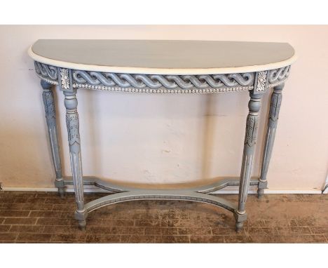 A Half Moon Console Table. The table painted in two-tone grey hues, on tapered legs with stretchers, approx 114 x 41 x 81 cms