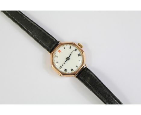 A Ladies 9ct Swiss Wrist Watch. The watch having a white enamel face with Roman dial, approx 20mm, approx 15.5 gms.