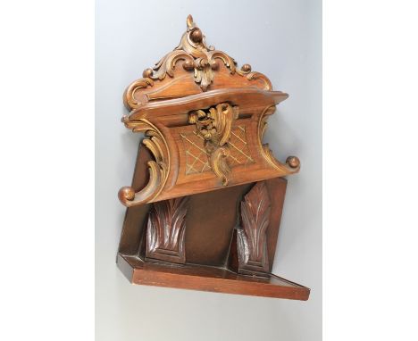 Two Wood-Carved Wall Shelves. The one shelf carved with scroll decoration, approx 36 w cms x 38 h cms and the other ecclesias