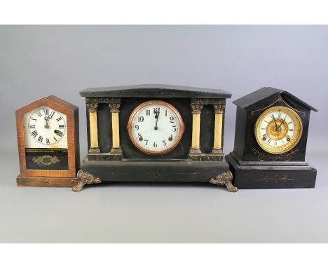 A Glass-Fronted Mantel Clock. The&nbsp;Black Slate Mantel Clock by Ansonia Clock Co, together with another black slate clock 