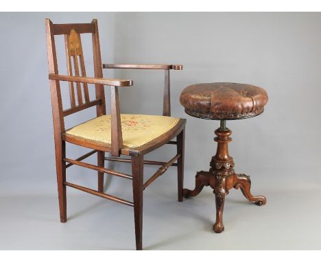 A Piano Stool. The adjustable round piano stool with leather seat and central tripod support, approx 60 cms, together with a 