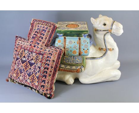 A Large Ceramic Camel Seat/Plant Stand. The seat together with a Turkish/Moroccan Kilim-style woolen saddle-bag. (2)