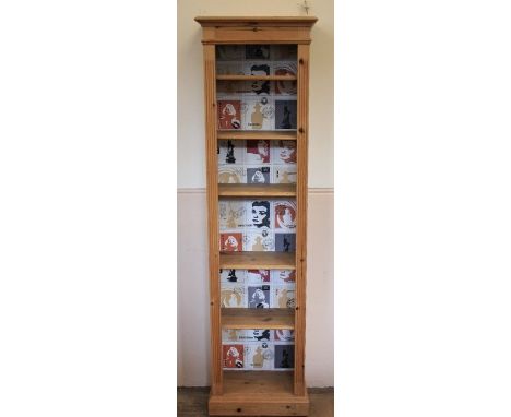A Tall Pine Four Shelf Book Case Unit. The shelves of the unit are adjustable, approx 51 x 29 x 182 cms.&nbsp;