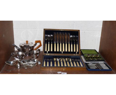 An Art Deco silver plated tea service, a set of fish knives and forks, assorted plated flatware etc